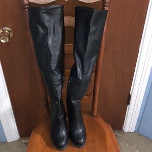 Black below the knee high boots